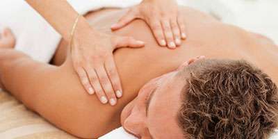 Craniosacral Therapy on Shoulder and Back